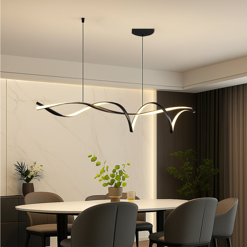 Linear LED pendant light hanging over a dining table