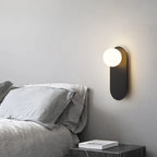 Minimalist Nordic Globe Wall Sconce with Oval Backplate – view 4 | BROKLEN
